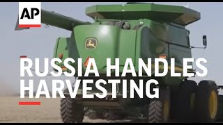 Russia handles harvesting in occupied eastern Ukraine [upl. by Ronni]