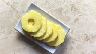 How to cut a fresh pineapple into rings [upl. by Oelgnaed]