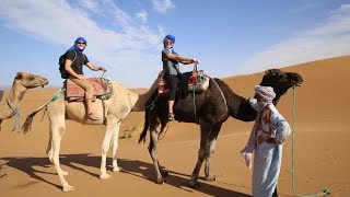 RIDING CAMELS THROUGH THE SAHARA  MOROCCO [upl. by Eriam]