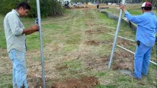 Setting Galvanized Fence Posts [upl. by Fotzsyzrk734]