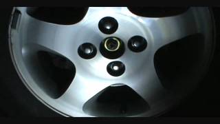 How to change Mazda Protege front wheel bearings part 1 [upl. by Durham334]